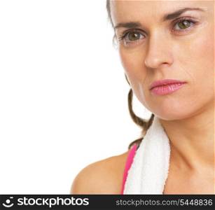 Closeup portrait of serious fitness young woman