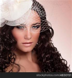 Closeup portrait of sexy girl wearing white hat with veil isolated on pink background, stylish bride, glamorous look, fashion and beauty concept
