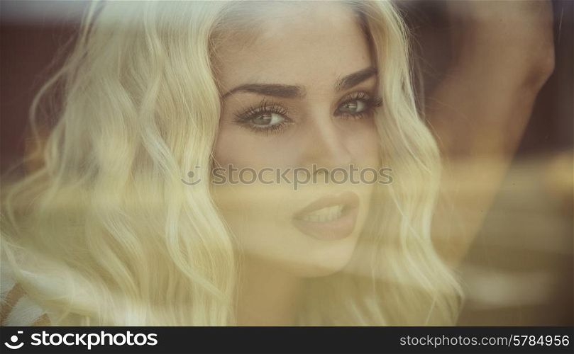 Closeup portrait of the sensual blond lady