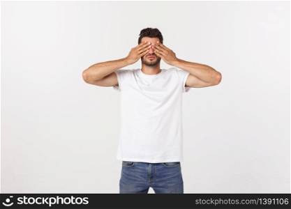 Closeup portrait of young guy, man, student, boy, worker, employee, closing eyes with hands, can&rsquo;t see, hiding, isolated on white background. Closeup portrait of young guy, man, student, boy, worker, employee, closing eyes with hands, can&rsquo;t see, hiding, isolated on white background.