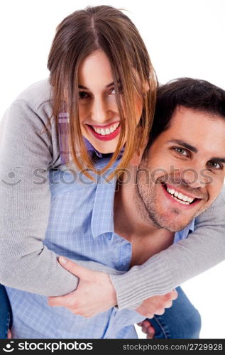 Closeup portrait of young man giving piggyride to her girlfriend on white background