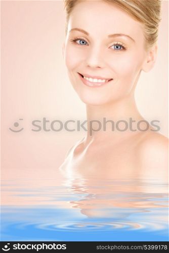 closeup portrait picture of beautiful woman in water