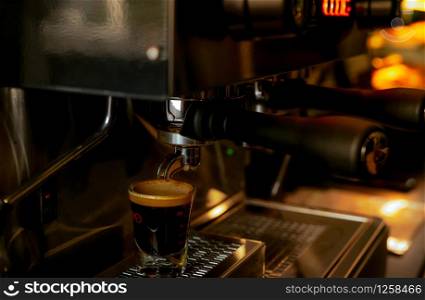 Closeup professional coffee machine in coffee shop. Coffee maker for make espresso, americano, latte, and cappuccino. Counter bar of coffee shop. Modern tool for barista. Beverage service business.