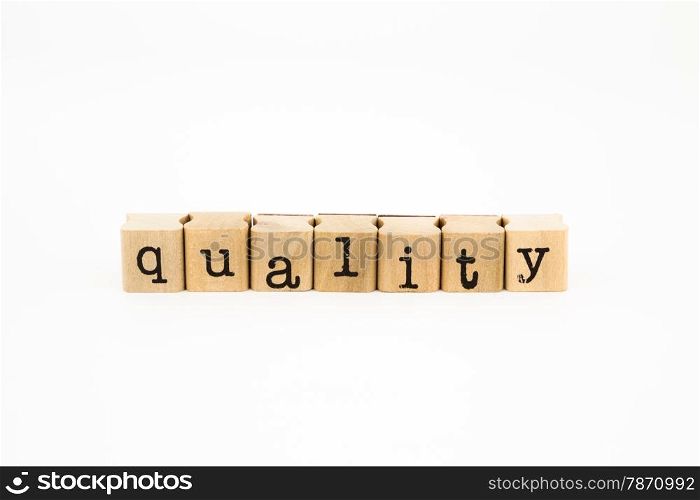 closeup quality wording isolate on white background, business and productivity concept and idea