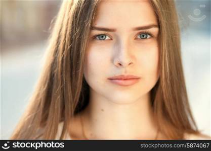Closeup sensual portrait of beautiful girl outdoors