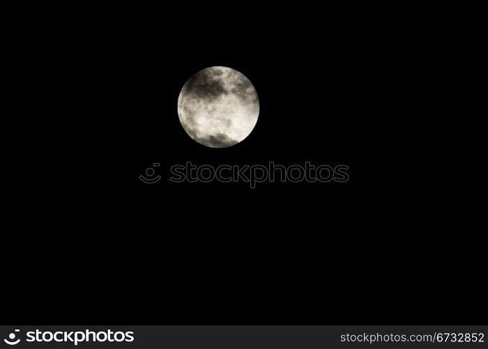 Closeup shot of a full moon on a black background