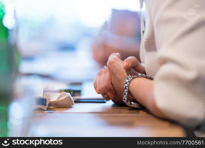 closeup shot of business people hands using pen while taking notes on education training during business seminar at modern conference room