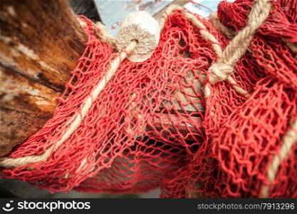 Closeup shot of natural fiber net on old wooden boat