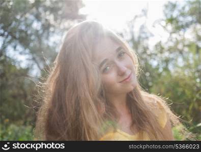 Closeup shot of the pretty girl. Pretty blonde outdoors. Colorized image