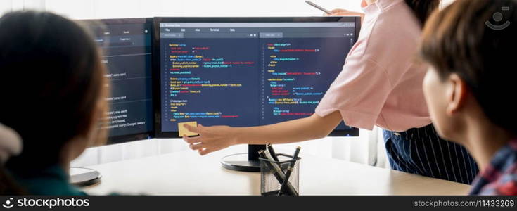 Closeup skilled young female programer present program coding and sharing programing idea while manager listening carefully.at modern office company. Java script, web design concept. Burgeoning.. Female programer present program coding while manager listening. Burgeoning.