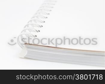 Closeup spiral notebook isolated on white background, stock photo