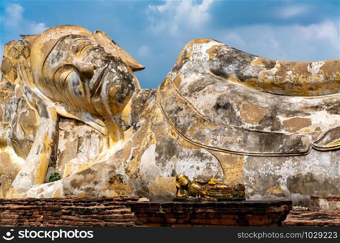 Closeup the famous Reclining Buddha Statue at Wat Lokayasutharam in Phra Nakon Si Ayutthaya province in Thailand