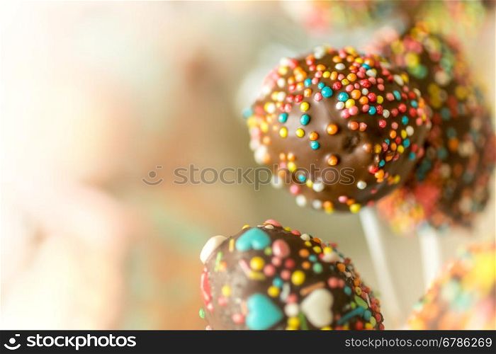 Closeup toned photo of colorful cake pops