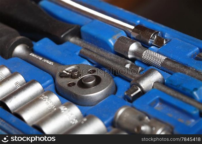 Closeup toolkit set of manual tools in blue box