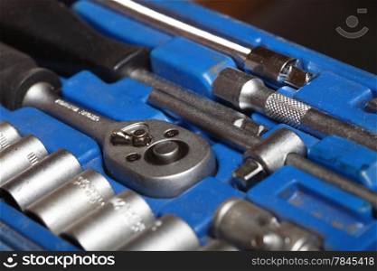 Closeup toolkit set of manual tools in blue box