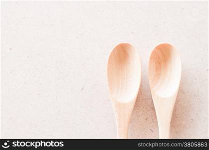 Closeup top view of two wooden spoons, stock photo