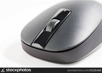 Closeup view of computer mouse on white background