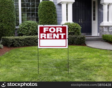 Closeup view of Modern Suburban Home with for Rent Sign in front Yard