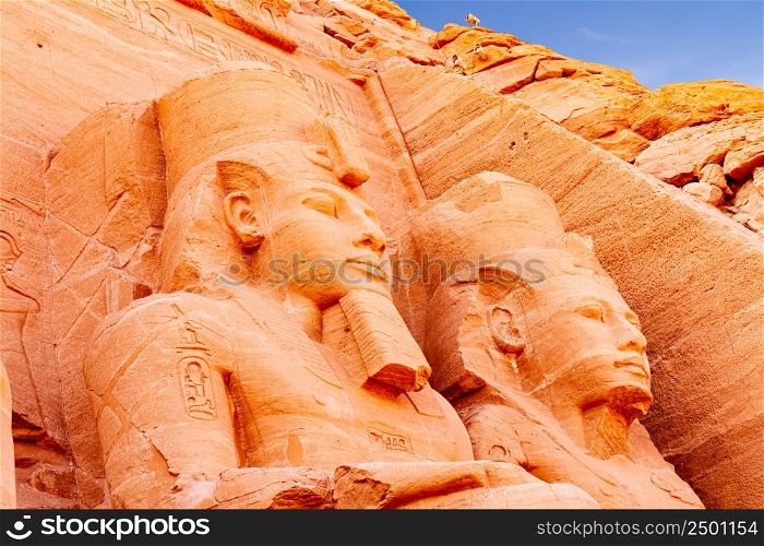 Closeup view of Pharaoh Rameses II statue in front of The Great Temple of Rameses II in Abu Simbel Village, Aswan, Upper Egypt.