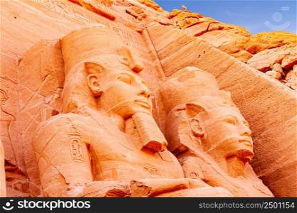 Closeup view of Pharaoh Rameses II statue in front of The Great Temple of Rameses II in Abu Simbel Village, Aswan, Upper Egypt.
