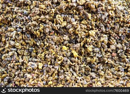 Closeup view of texture of dry green tea. Can be used as food or nature background
