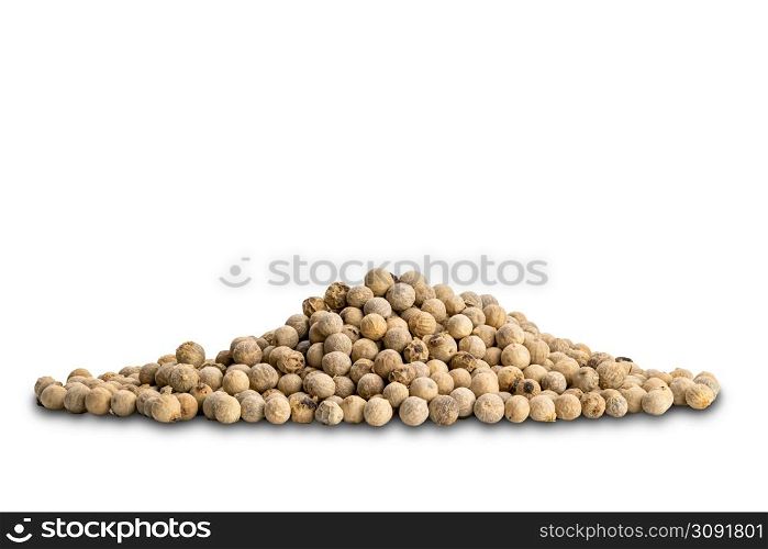 Closeup view pile of natural white pepper seeds on white background with clipping path.