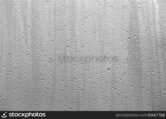 Closeup water condensation on window glass background. Closeup water condensation on window glass background.