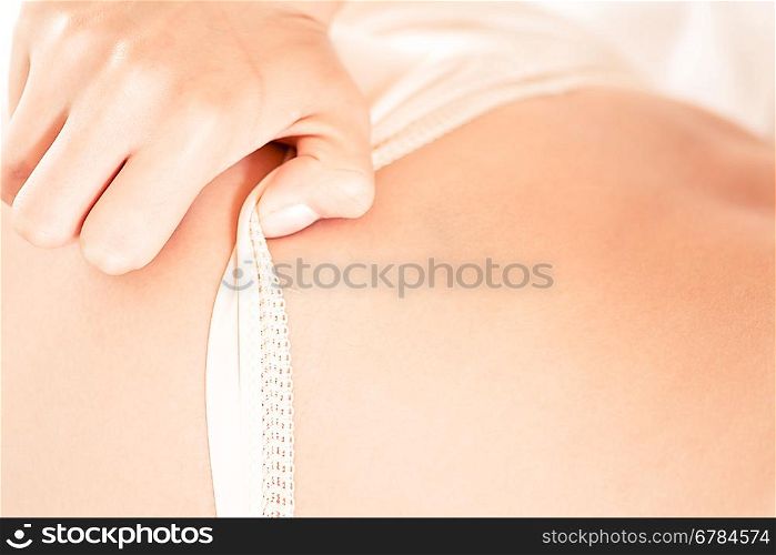 closeup white underwear and heand undress