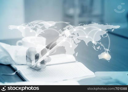 Closeup woman check and sending message hand holding smart mobile phone on network world map background, business communication concept, Elements of this image furnished by NASA.