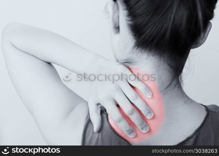 closeup women neck and shoulder pain/injury with red highlights . closeup women neck and shoulder pain/injury with red highlights on pain area with white backgrounds, healthcare and medical concept - B&W filter