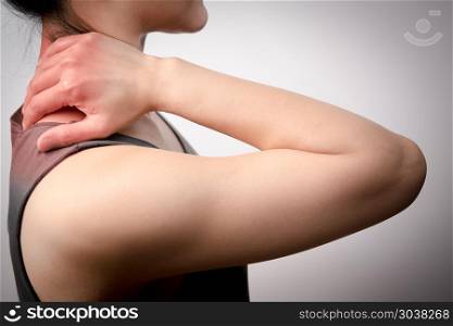 closeup women neck and shoulder pain/injury with red highlights . closeup women neck and shoulder pain/injury with red highlights on pain area with white backgrounds, healthcare and medical concept