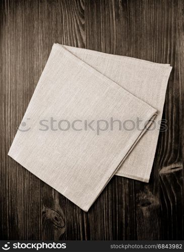 cloth napkin on wood. cloth napkin on wooden background