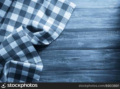 cloth napkin on wooden background