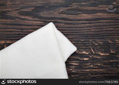 cloth napkin on wooden table background. cloth napkin on wooden table