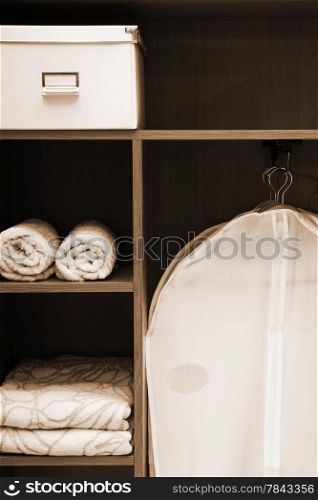 Clothes and towels in a wooden case