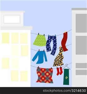 Clothes hanging on clotheslines between two buildings