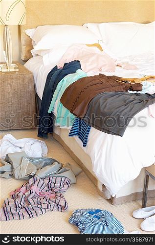 Clothes on Floor and Bed
