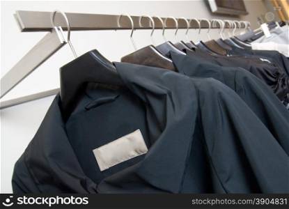 clothes on racks in store