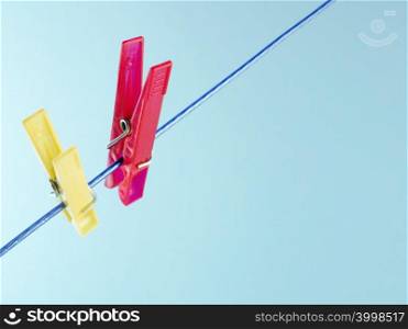 Clothes pegs on washing line