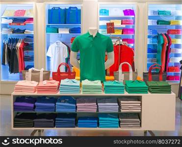 clothes shop with shirt hanged on stand
