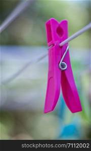 Clothespin clamp on rope, colourful, outdoors