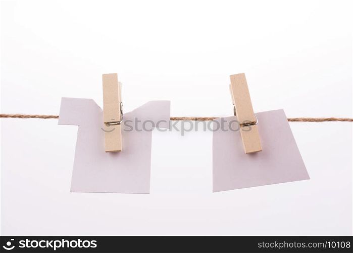 Clothespins holding clothes