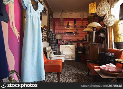 Clothing and Furniture in Crowded Second Hand Store