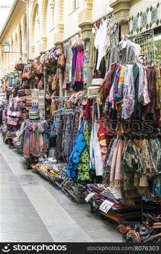 Clothing and souvenirs on arab market. Street market