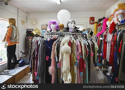 Clothing and Wigs in Crowded Second Hand Store
