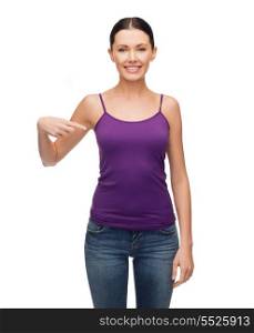 clothing design and gesture concept - smiling girl in blank purple tank top pointing her finger at herself