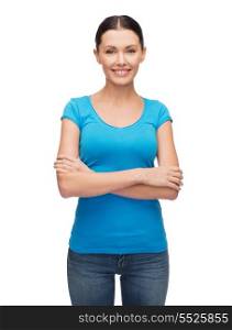 clothing design and happy people concept - smiling girl in blank blue t-shirt