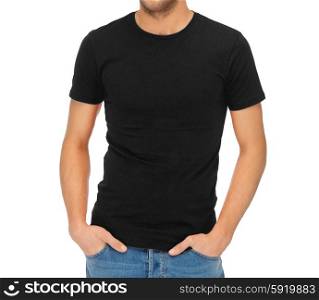 clothing design concept - handsome man in blank black t-shirt. man in blank black t-shirt