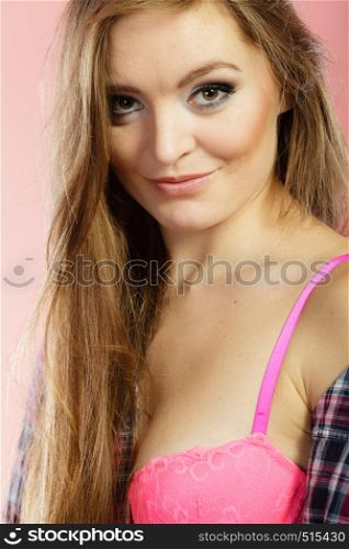 Clothing fashion people concept. Attractive lady wearing underwear. Young woman has long hair and shirt. Studio shot.. Attractive lady wearing underwear.