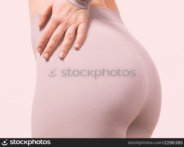 Clothing fashion sport concept. Part body picture with thermoactive underwear. Attractive fit woman promoting sporty clothes.. Part body picture with underwear.